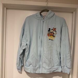 Disneyland Paris Light Blue Zip-Up Hoodie with Hidden Pockets